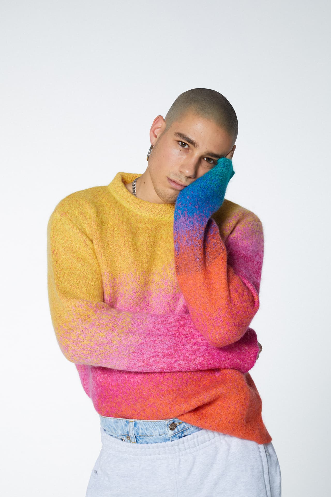 Model wearing an expressive multicoloured knit